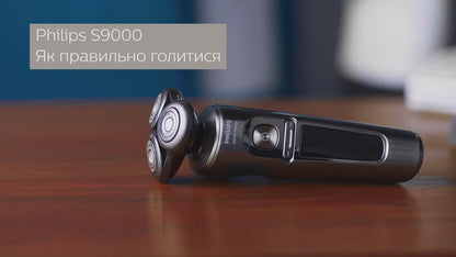 Бритва электрическая Philips серии 9000 S9975/55  сухое/ влажное бритье одна бритвенная головка, со станцией очистки и откидным триммером, жесткий чехол, моб. приложение