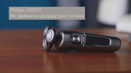 Бритва электрическая Philips серии 9000 S9975/55  сухое/ влажное бритье одна бритвенная головка, со станцией очистки и откидным триммером, жесткий чехол, моб. приложение